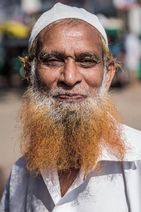 Portrait of a Man, Bangladesh: an elderly man with a henna-dyed beard and white cap. Photograph by Marcus Vallance.